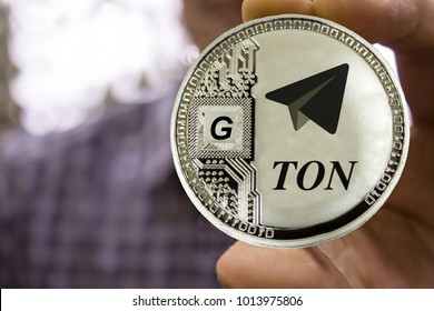 Cryptocurrency TON From Telegram In The Man's Hand. Gram