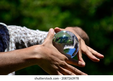 Crystal Ball Or Contact Ball, Juggling Act, With The Acrylic Or Crystal Ball In His Hands