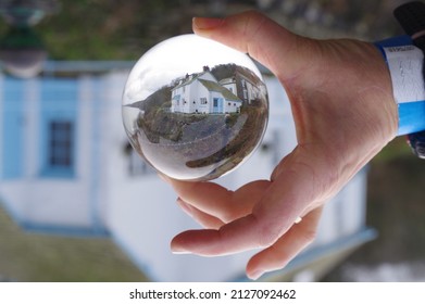 Crystal Ball Image Of Seaside Cottage