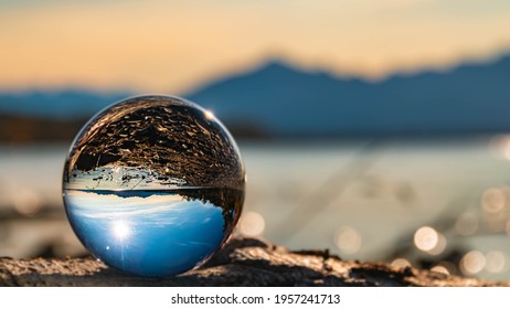 Crystal ball landscape shot at the famous Chiemsee, Chieming, Bavaria, Germany