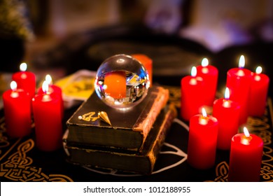 Crystal Ball To Prophesy Or Esoteric Clairvoyance During A Seance In The Candle Light