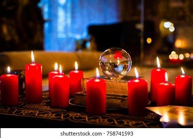 Crystal Ball To Prophesy Or Esoteric Clairvoyance During A Seance In The Candle Light