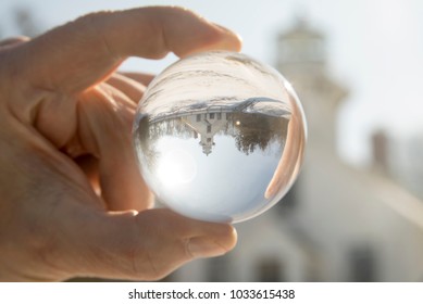 Crystal Ball Reflecting Exterior Of Old Mission Lighthouse In Traverse CIty, Michigan In Winter.