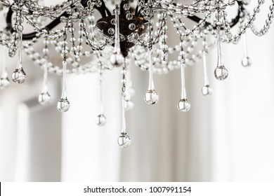 Crystal chandelier close up on white background