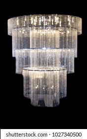 Crystal chandelier close-up. Clean background. Richly Theatrical Chandelier In Modern Vintage Interior With Modern Energy Saving Lamps