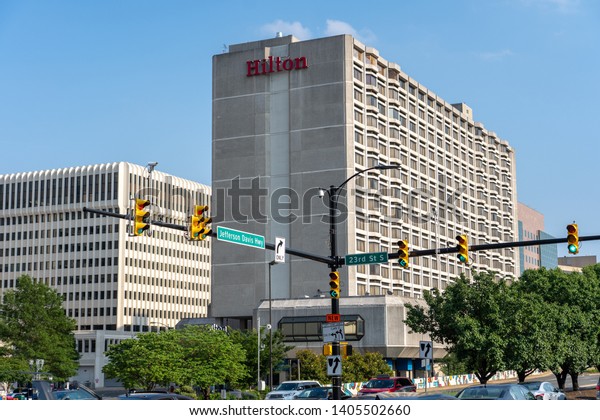 Crystal City,\
Virginia, USA - May 18, 2019: Buildings and vehicles on heavily\
trafficked Jefferson Davis Highway in Crystal City, location of\
Amazon HQ2 in Arlington\
County.