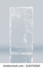 Crystal clear frosty textured natural ice block on plain background on mirroring surface.