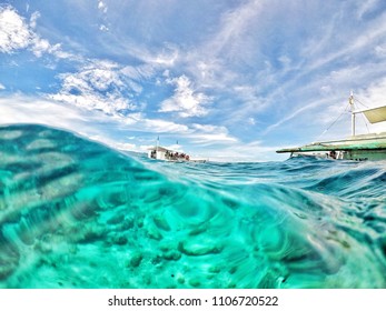 Crystal Clear Sea Wave In Moalboal