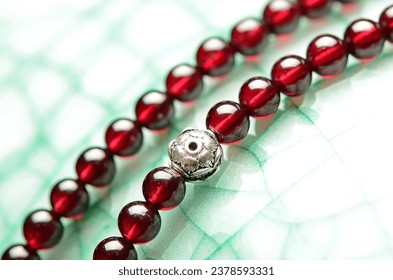 Crystal Garnet Bracelet on Retro Background