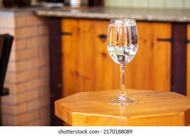 Crystal Glass With Water On The Table. Stay Hydrated Concept. Concept Of Fluid Balance Or Homeostasis. Importance Of Drinking Water For Health