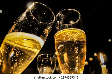 Crystal Glasses With Sparkling Champagne In An Attitude Of Toast. High Class Party. Christmas Or New Year Social Gathering.