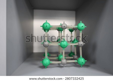 Crystal lattice model representing materials science, nanotechnology and molecular engineering. Scientific research concept related to chemistry, physics, advanced materials and innovation.