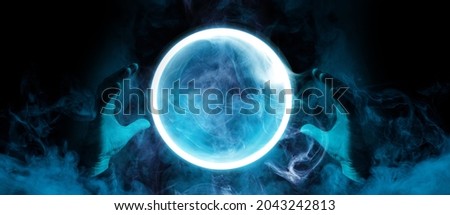 Crystal sphere in hands. Magic ball predictions. Mysterious composition. Fortune teller, mind power, prediction, halloween concept. Wide angle horizontal wallpaper or web banner. Mockup for your logo.