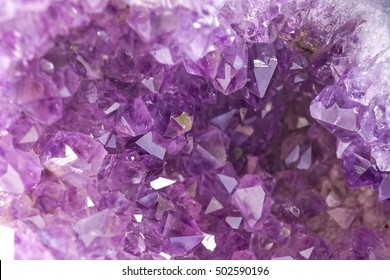 Crystal Stone macro mineral, purple rough amethyst quartz crystals, Abstract purple background of gemstone