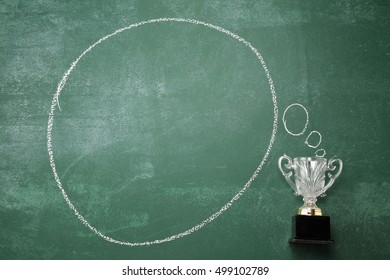 crystal trophy and thinking bubble