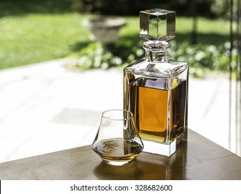 Crystal Whiskey Decanter And Glass Of Whiskey