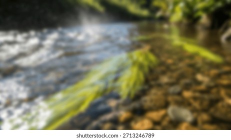 Crystalclear river stream flowing through sunlit nature with with vibrant green plants.