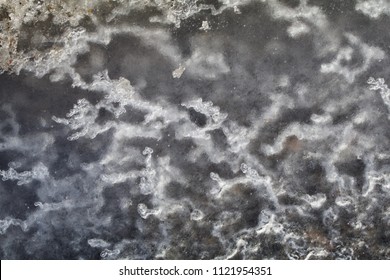 Crystaline paths show through translucent ice