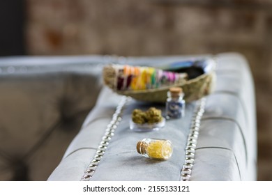 Crystals and cannabis on a silver chair