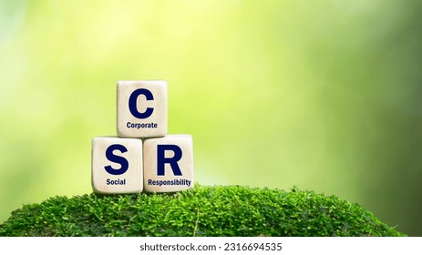 CSR Banner Business and Corporate Concept, Corporate Social Responsibility and Giving Back to Community, CSR icon on wooden block green background