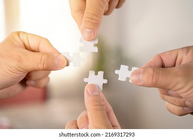 CSR (coporate Social Responsibility) Or Teamwork Concept.Hands Holding Jigsaw.Autism Awareness Day Kid Child.business People Putting Jigsaw For Team Together.Charity, Volunteer. Unity, Team Business.