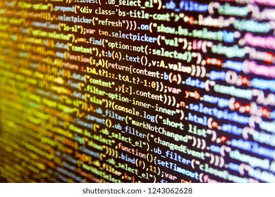 Css3 code on a colorful background. Web design business working time. Php coding Close-Up. Screen at workplace of modern programmer on networking background. Coworkers team in modern office. 