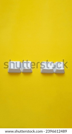 Ctrl C, Ctrl V keyboard buttons, copy and paste key shortcut isolated on a yellow background.