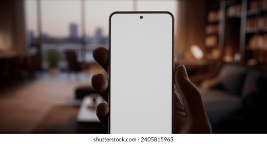 CU Black African-American man using his phone at home. Daytime shot, furnished house interior in the background. Blank screen, smartphone smart home, automation, food delivery application mockup - Powered by Shutterstock