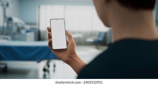 CU Caucasian man doctor or patient using his phone inside hospital room. Blank screen healthcare, insurance, telemedecine app application smartphone mockup - Powered by Shutterstock