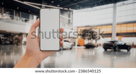 CU Caucasian woman using his phone inside the car dealership. Insurance, banking, online marketplace blank screen smartphone mockup