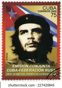 CUBA -CIRCA 2009: A stamp printed in Cuba shows commander Ernesto Guevara de la Serna (Che Guevara) and the Republic of Cuba national flag, 50th anniversary of the Cuban revolution Victory, circa 2009