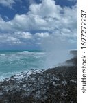 Cuba cloudy sky and splashing waves