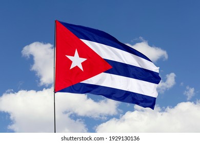 Cuba flag isolated on sky background with clipping path. close up waving flag of Cuba. flag symbols of Cuba.