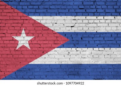 Cuba flag is painted onto an old brick wall - Powered by Shutterstock