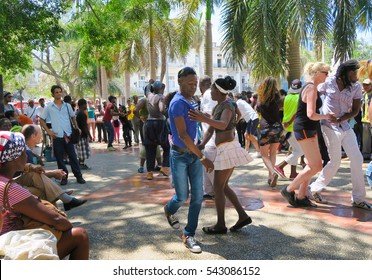 Cuba, Havana - 07 April, 2016: Street Dances Of Salsa In One Of The Central Squares In Havana, Where Both The Locals And The Tourists Can Take The Dancefloor And Dance Till They Drop, A Fun Event 