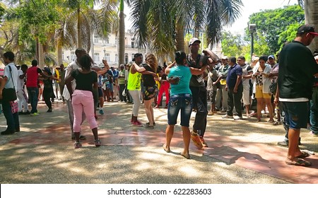 Cuba, Havana - 07 April, 2016: Street Dances Of Salsa In One Of The Central Squares In Havana, Where Both The Locals And The Tourists Can Take The Dancefloor And Dance Till They Drop, A Fun Event 