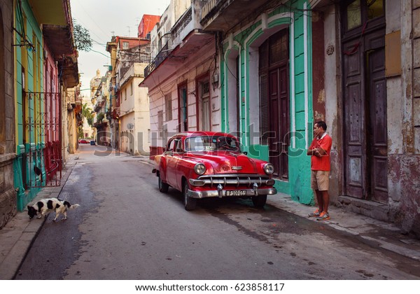 Cuba, Havana - 19 February 2017: retro vintage\
car in the colourful streets. Cuba have many old american cars\
restaured. Editorial\
picture.