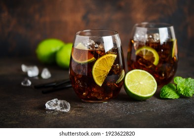 Cuba Libre with brown rum, cola and lime. Cuba Libre or long island cocktail.