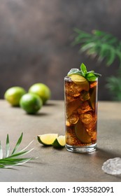 Cuba libre cocktail with lime and ice. Copy space for text.  Summer refreshing drink