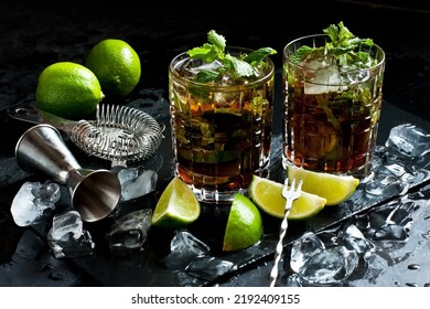 Cuba Libre Cool Cocktail Of Cola, Rum,  Lime, Mint And Soda, In  Glass With Ice, Holidays Party Concept