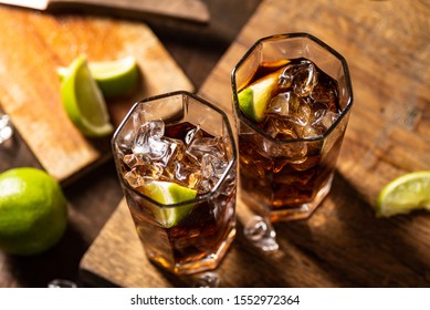 Cuba Libre Drink On Wooden Table
