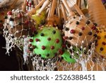 Cuba, province Sancti Spiritus,Trinidad. Street markets, handicrafts, local arts and musical items for sale. These percussion instruments are called shakeres or shekeres. 2016-03-29