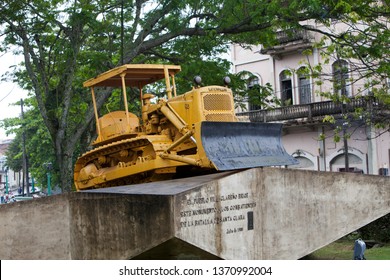 CUBA, SANTA CLARA- FEBRUARY 02, 2013: Monument To The Derailment Of The Armored Train. Caterpillar Bulldozer Used To Break The Rails

