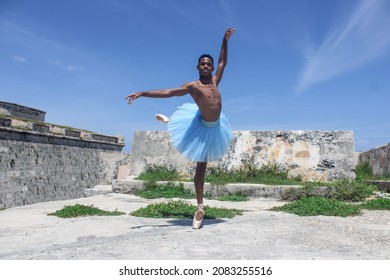 Cuban Dancer Performs Contemporary Dance Movements In An Iconic Place In Havana. Cuban Dance And Culture. 