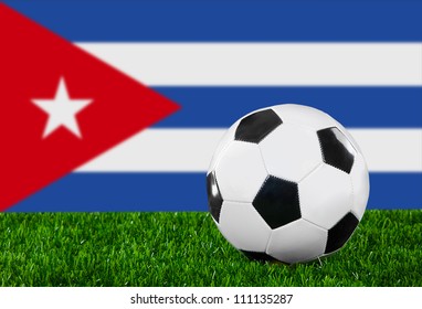 The Cuban flag and soccer ball on the green grass - Powered by Shutterstock