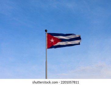 Cuban Flag Waving Against Sky