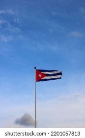 Cuban Flag Waving Against Sky