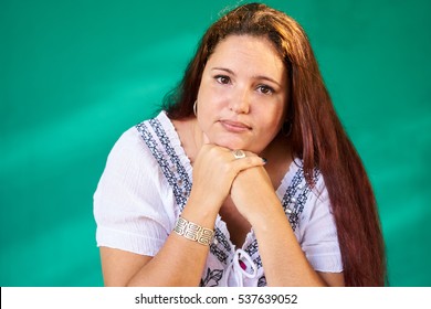 Cuban People And Emotions, Portrait Of Sad Overweight Latina Looking At Camera. Depressed Fat Hispanic Young Woman From Havana, Cuba.