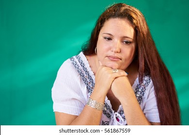 Cuban People And Emotions, Portrait Of Sad Overweight Latina Looking Down. Depressed Fat Hispanic Young Woman From Havana, Cuba.