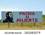Cuban road advertising board stating patriotism or death